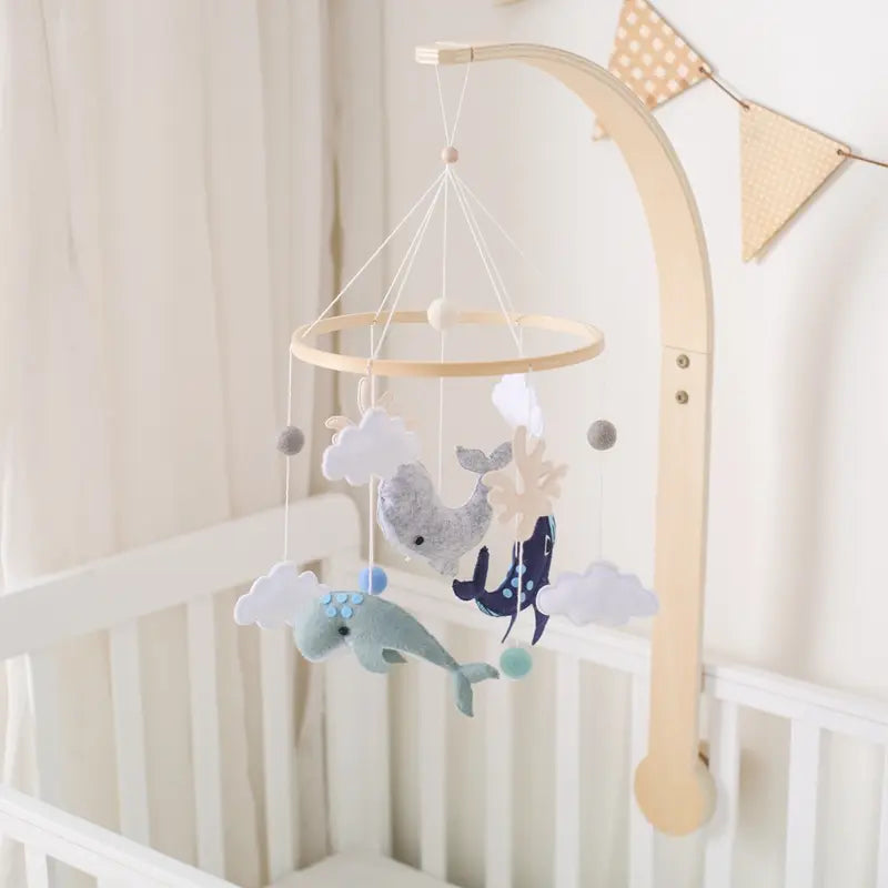 Mobile-Lit-bebe-Baleine-materiel-noble